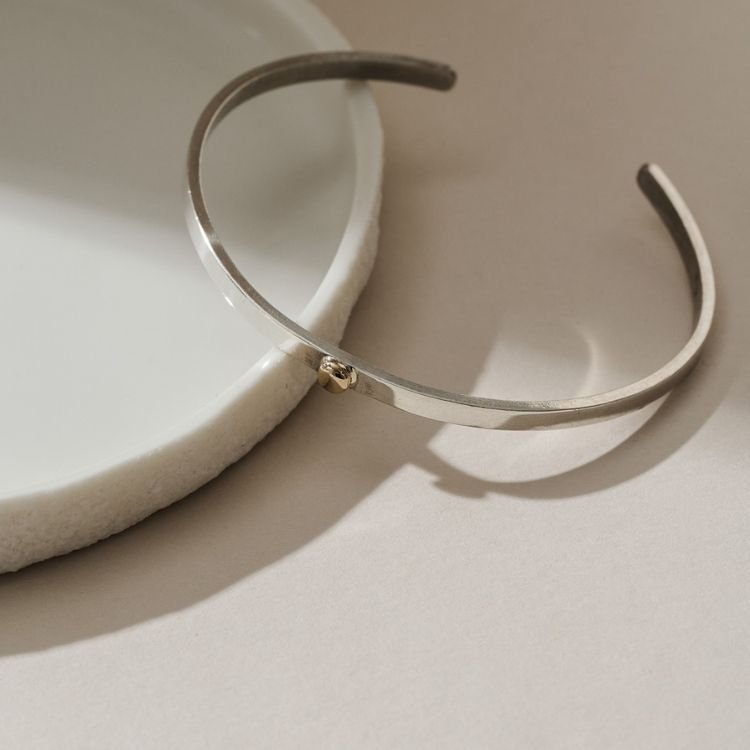 Dainty Sterling Silver Cuff Bangle Bracelet with 9ct Gold Bobble - Samuel Perry