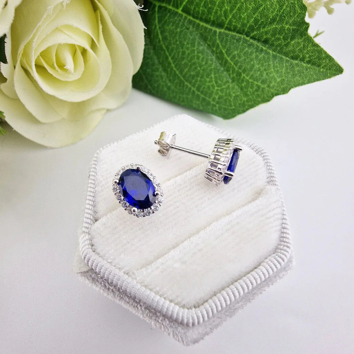 Sterling Silver Blue Sapphire CZ Oval Cluster Stud Earrings - Samuel Perry